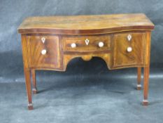 A delightful 18th century miniature serpentine 'sideboard' in mahogany,