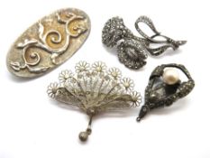 Two hallmarked silver brooches, an 800 silver filigree brooch and a white metal clip.