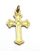 A 9ct gold crucifix pendant, stamped 9ct, 3cm inc bale, 1.2g.