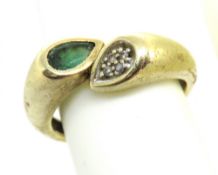 A 14ct gold emerald and diamond ring, hallmarked 585, size N,