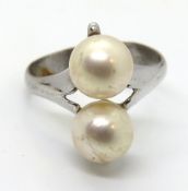 A pearl ring, size O.