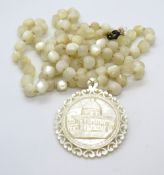 A mother of pearl beaded rosary type nec