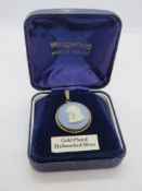 A Wedgwood ceramic panel pendant, silver
