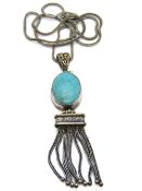 A large and impressive Native American style turqouuise pendant,