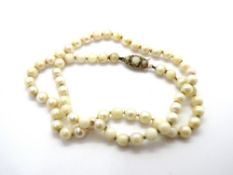 A single strand pearl necklace, pearls a/f, having 9ct gold clasp, hallmarked 375.