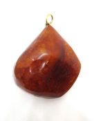 A huge amber pendant having yellow metal loop, approx 4.5 x 4cm without bale.