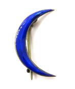 A hallmarked silver and blue guilloche enamelled crescent moon brooch, approx 2.5cm.