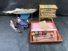 A quantity of vintage toys including miniature piano, sail boat, clockwork toys, mini croquet.