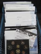 Sixteen base metal proof coin sets.