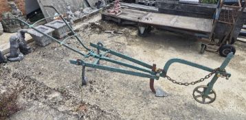 An antique horse-drawn walking plow