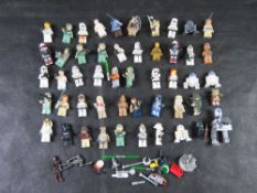 Fifty Star Wars Lego minifigures.