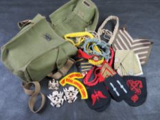 A quantity of military patches and badges.