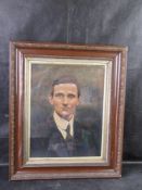 A pastel portrait of young man in an ornate frame with lacquered finish and gilded moulded details,