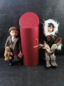 A contemporary porcelain Native Alaskan doll together with a H.
