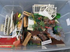 A quantity of Britains farm accessories.