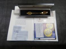 A hallmarked silver 'Queen Elizabeth II 80th Birthday' spoon by The London Mint.