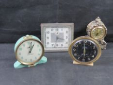 Four vintage clocks including Smith alarm clock, Big Ben by Westclox etc.