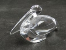 A vintage Baccarat crystal pelican figurine with marks to base.