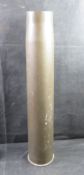 A large brass shell.