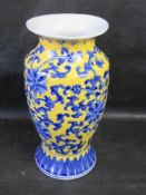 A contemporary Chinese blue and yellow vase, a/f.