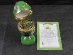 A Bradford Exchange Flying Scotsman 80th Anniversary jewelled egg with certificate.