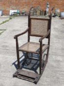 A 'Carstairs' lightweight wheelchair manufactured by Carters (J & A) Ltd, London, England, c.