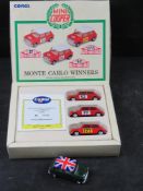 A Corgi Classics 1:43 scale die-cast model set (Model Number 97712) featuring three Mini Cooper