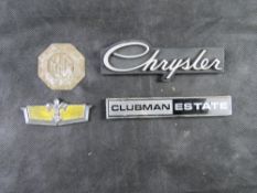 Four car badges being; Chrysler, Mini Clubman Estate, MG, and Chevrolet.