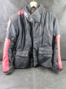 A REV'IT! Siren motorcycle jacket, size 44, with back elbow and shoulder protection.