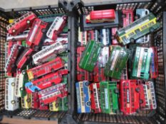 A quantity of assorted scale model busses, loose.