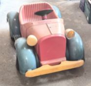 A vintage Giordani pedal car with Donald Duck design c1960-70s.