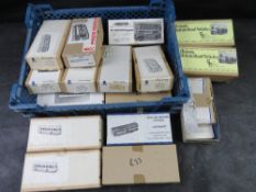 A quantity of boxed 1:76 scale (OO gauge) white metal model bus kits from manufacturers like Pirate