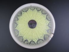 A 1970's glass fluorescent bulb lamp shade, 40cm diameter.