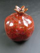 A 1970's style lava coloured pomegranate bud vase,