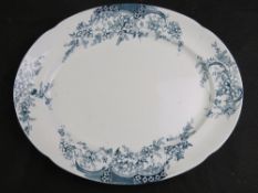 A green and white floral pattern meat serving dish, 41cm wide.