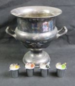 A silver plated champagne ice bucket with twin end handles, standing 24cm high.