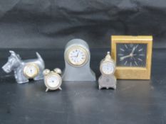Five miniature mantle clocks