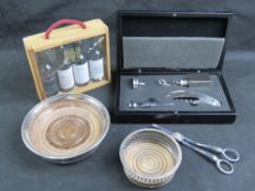 Two silver plated wine coasters, together with four miniature bottles of Port,
