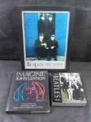 The Beatles memorabilia including framed 'signed' print and two books.