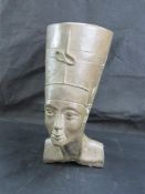A large bust of Nefertiti, patinated bronze effect 40cm high.