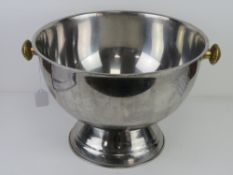 A large champagne bath, steel with brass handles, 41.5cm dia, 30cm high.