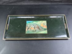 A late 20th century lacquered tea tray having Indian image of Krishna subduing Kaliya upon,