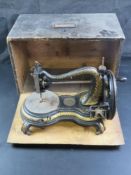 A vintage sewing machine in box.