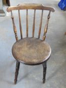 A single late 19th or early 20th century penny Windsor chair having distinctive cresting rail and