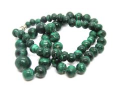 A heavy malachite bead necklace, 93.