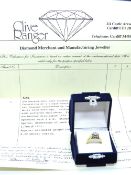 A hallmarked 18ct gold diamond cluster ring, in presentation box with jewelers valuation from 1994,