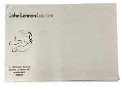 An incomplete portfolio of 9 prints (of 14) from John Lennon's 'Bag One'. This example published