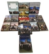 DOWNTON ABBEY: A collection of various books and series DVDs