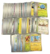 POKEMON TCG: A collection of various mixed generation cards, including holographics