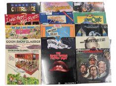 Box of videodiscs LP records, an eclectic mix to include Disney, soundtracks (Rock Horror, Natural